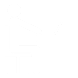 Osoba siedząca przy biurku z laptopem